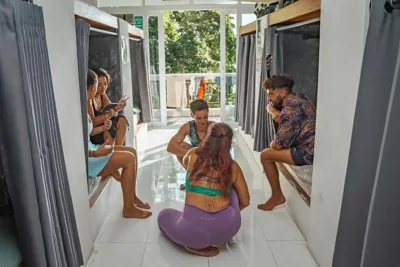 Posto letto in dormitorio femminile — Blue Chitta Yoga & Freediving